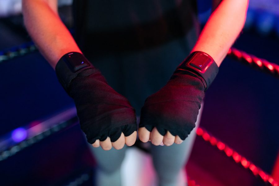 Female boxer wears engineered performance tracking devices by This is Engineering image library is licensed under CC BY-NC-ND 2.0