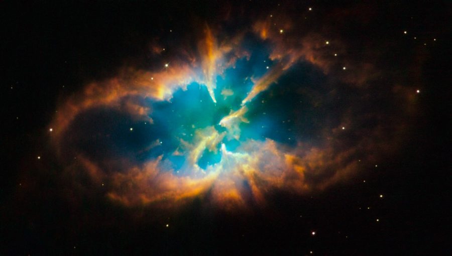 "Planetary Nebula NGC 2818" by Hubble Heritage is licensed with CC BY-SA 2.0. To view a copy of this license, visit https://creativecommons.org/licenses/by-sa/2.0/