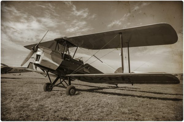 grayscale photo of monoplane