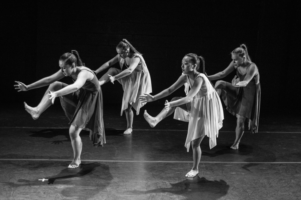 four women dancing grayscale photography