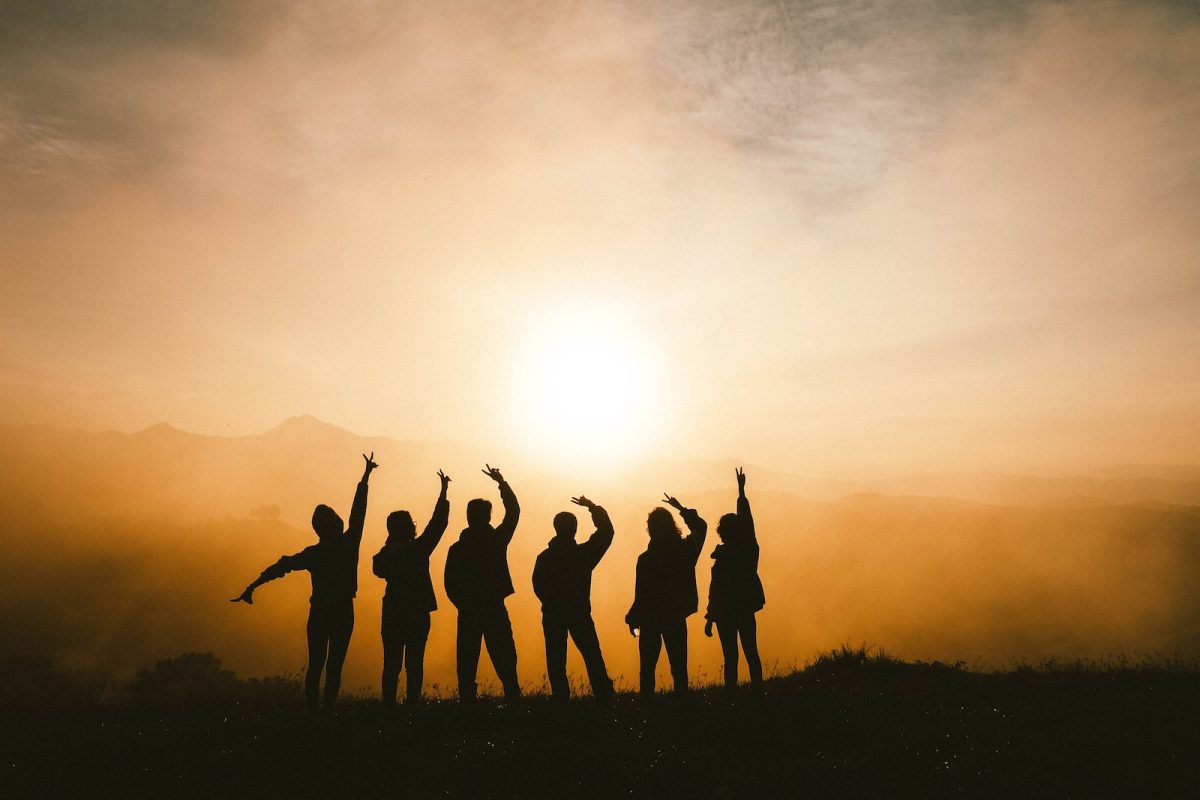 silhouette+photo+of+six+persons+on+top+of+mountain