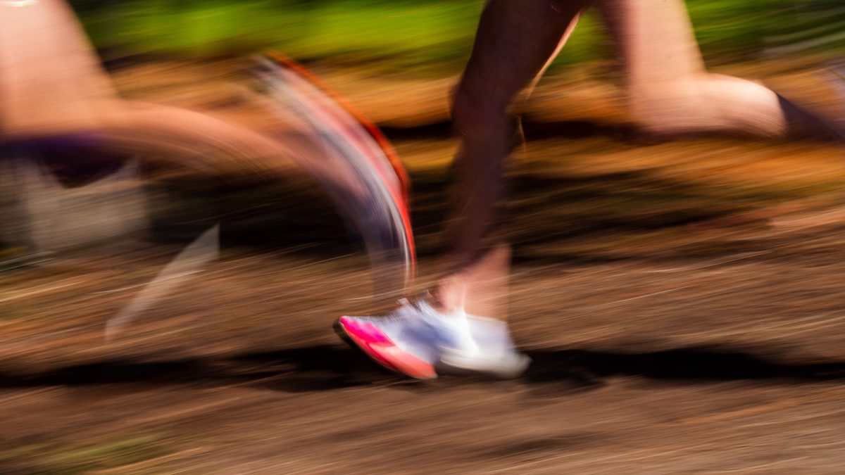 a blurry photo of a person running